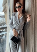 BARODA Zilverkleurige jumpsuit met lange mouwen van stretchfluweel