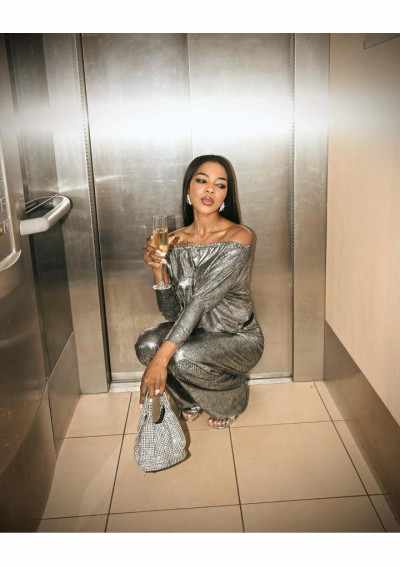 NAFISSA Mono plateado manga larga con pantalón botín recto